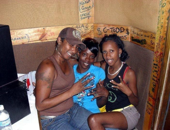 Three women sharing a moment inside the Exodus studio