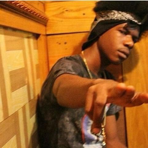 A young member of the sound-system community inside the studio